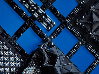 flatback and sew-on crystals in black color Jet on blue fabric