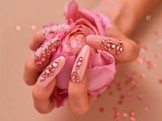 Nails with rose peach crystals and roses