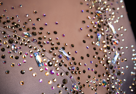 detail of a dance dress with flatback rhinestones 