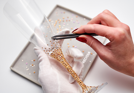 champagne glasses with gold crystals