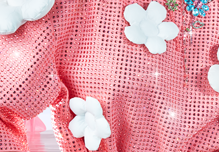 Rose peach crystals applied on pink fabric