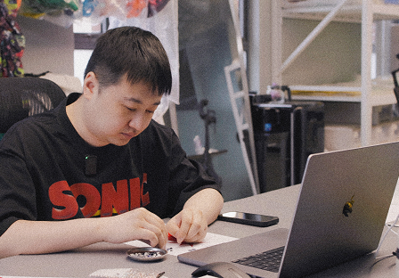 Founder and Designer of Windowsen working with crystals