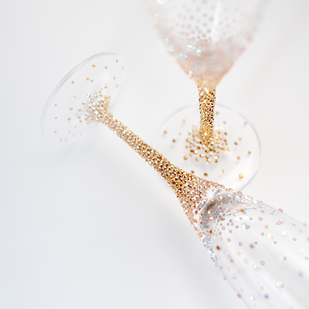champagne glasses with gold crystals